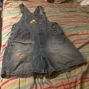 Disney one piece jumpsuit that is Size X L  I think and it’s used